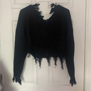 Black long sleeve, fringed.